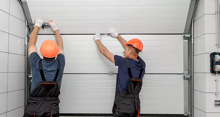 Garage Door Bottom Panel Repair in Englewood, FL